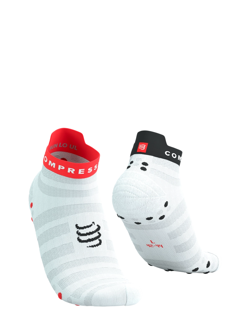 Chaussettes Compressport Ultralight Run blanches et corail basses
